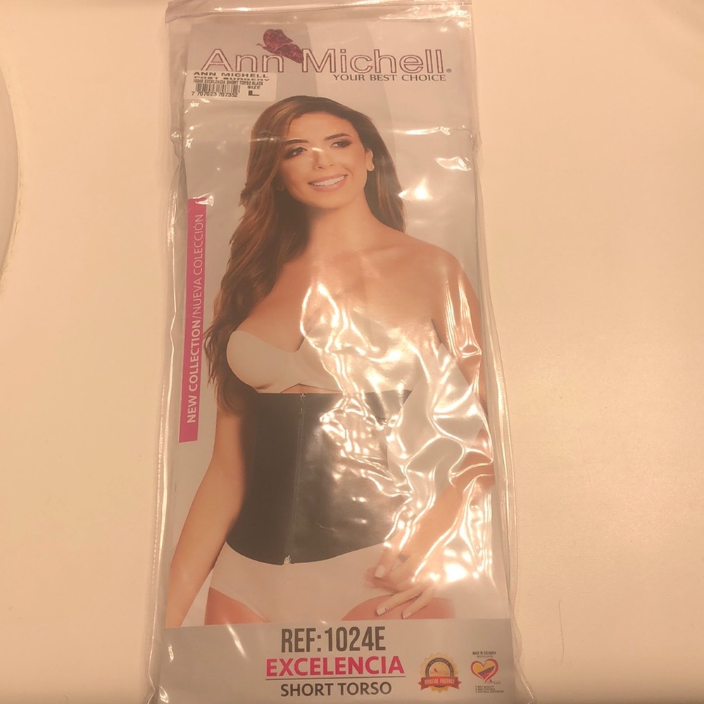 This a Ann Michell waist trainer size Large in the color black.